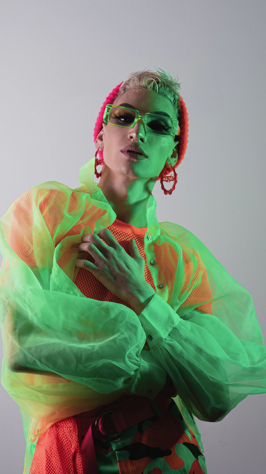 woman in green and orange hijab