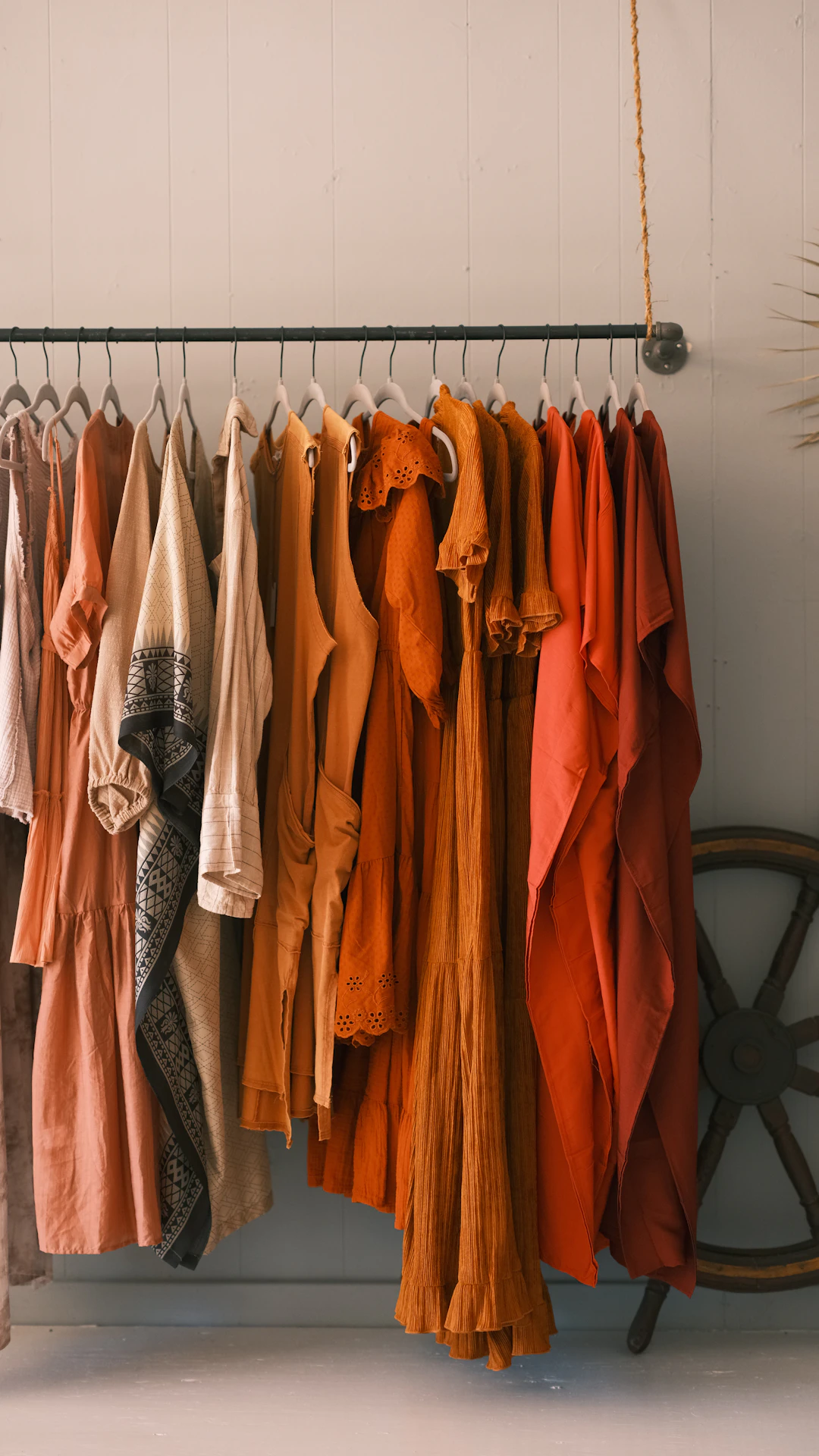 a row of clothes on a swinger