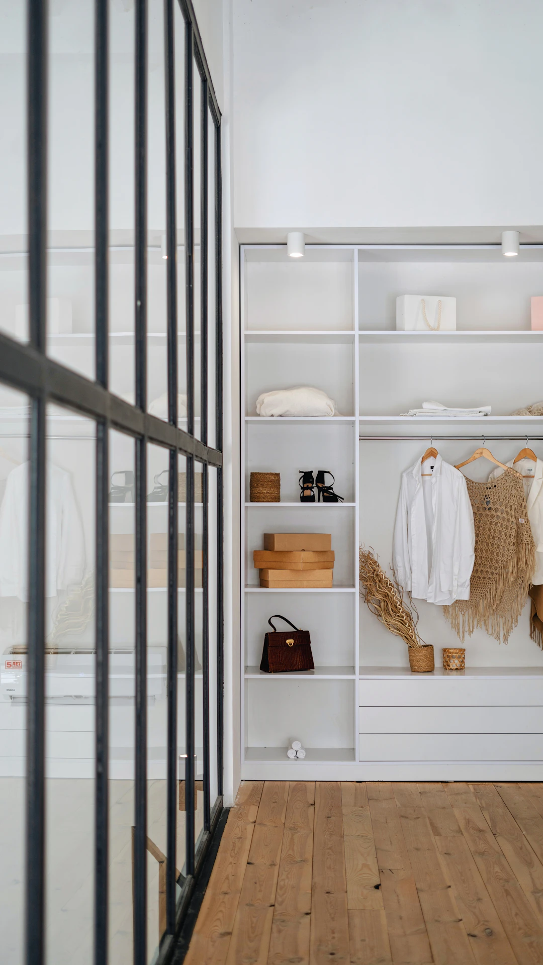 white bath towel on white wooden cabinet