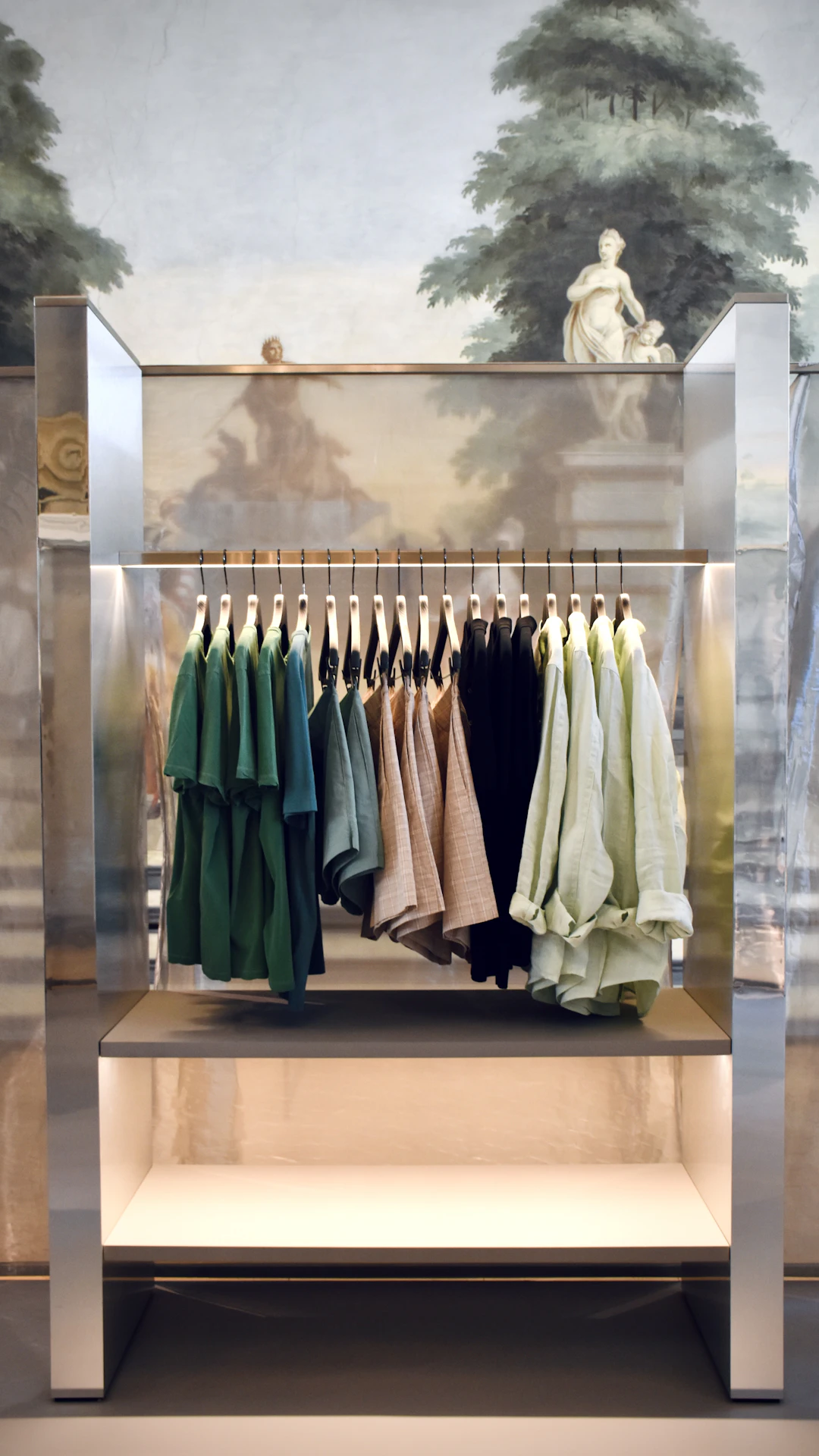 a display case with clothes