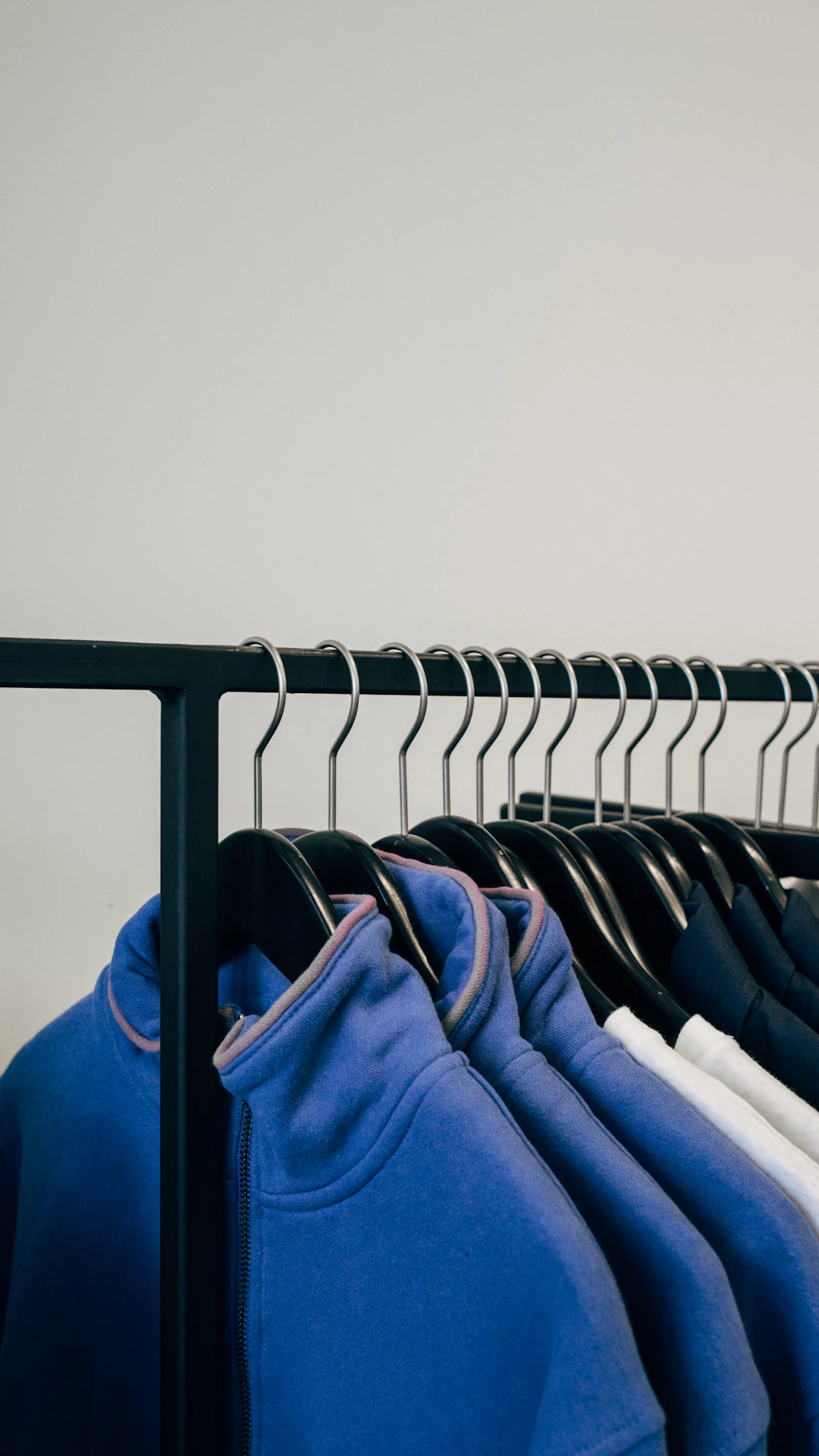 assorted-color shirt on rack